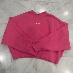 Pink woman’s Nike sweatshirt
